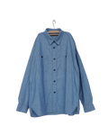 Chemise en chambray de coton bleu Merci Paris avec deux poches poitrine et coutures robustes