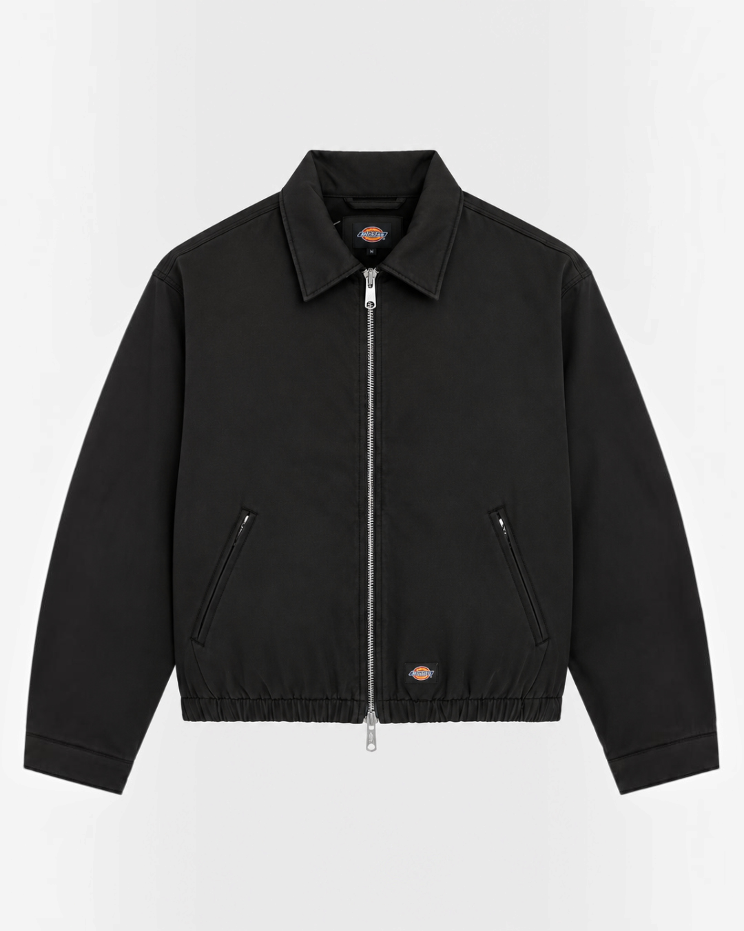 Black cotton Eisenhower jacket from Merci Paris, workwear style with zip fastening and classic collar.