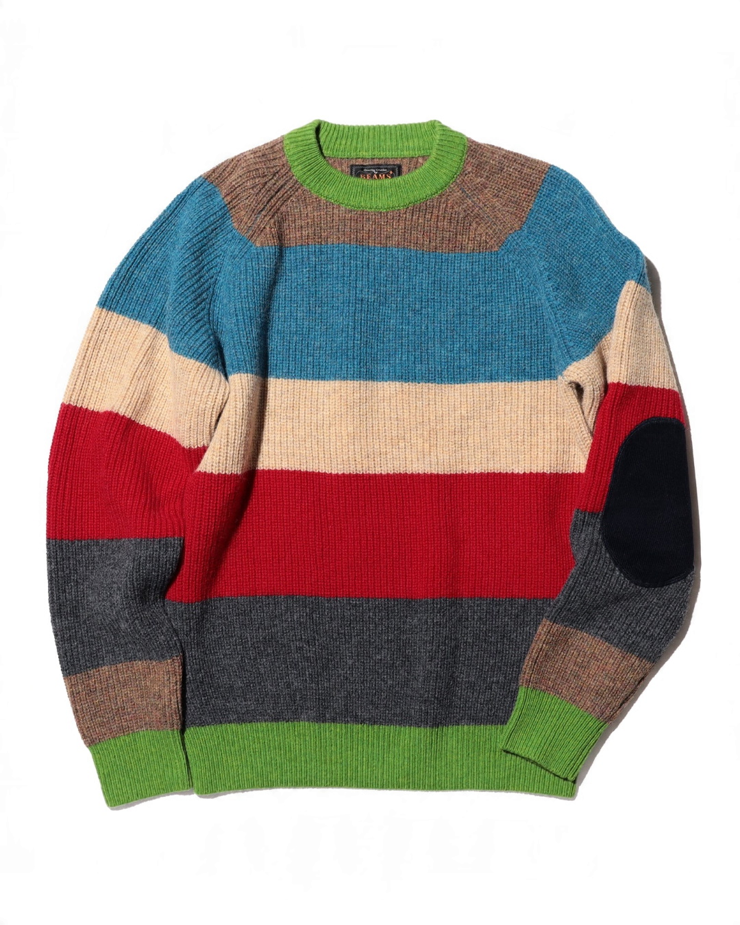 Pull Merci Paris Beams Plus en laine épaisse à rayures multicolores, col rond vert et coudières bleu marine.