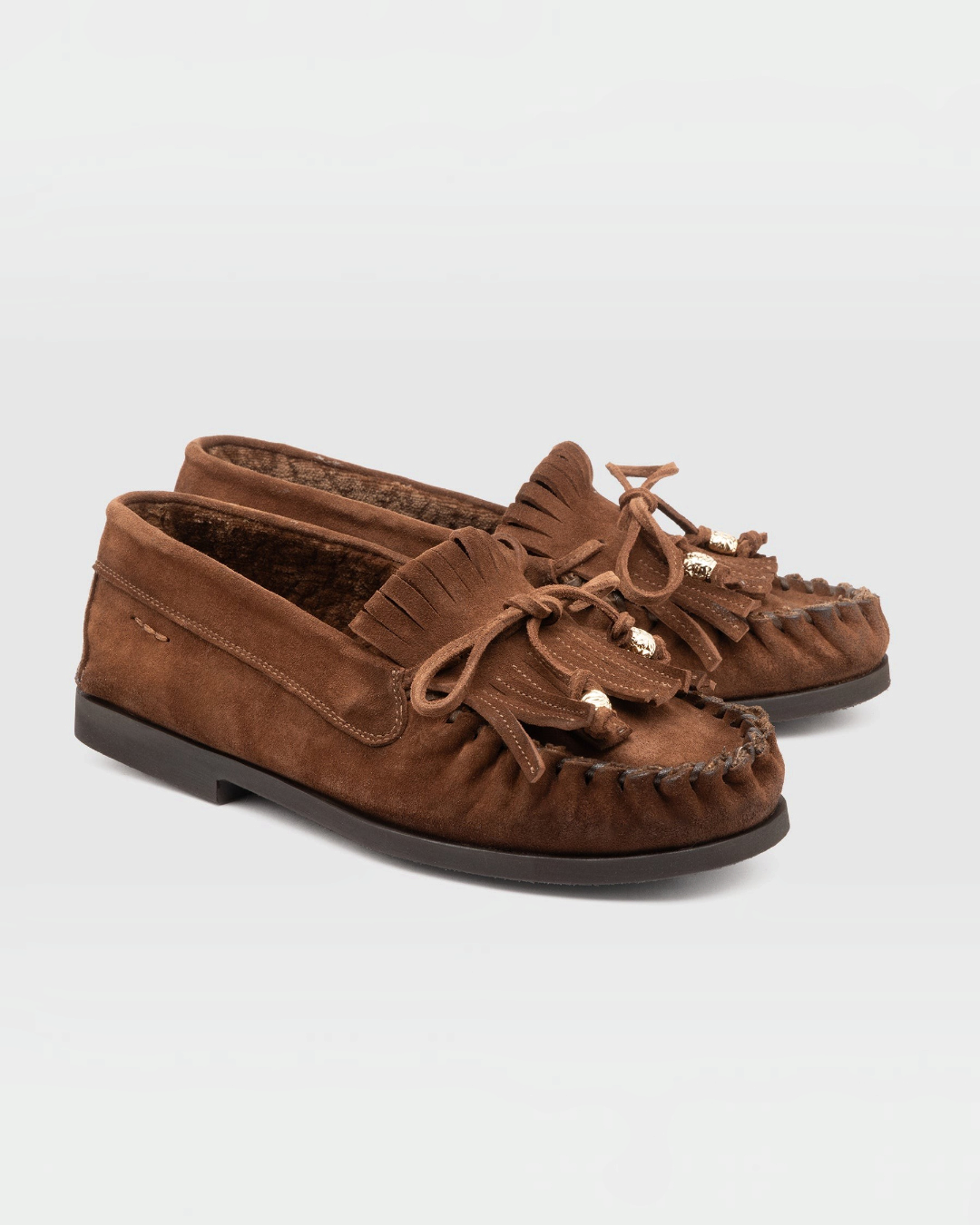 Mocassins Merci Paris Alexander Hotto en daim marron avec franges, lacets décoratifs et semelle en caoutchouc