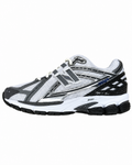 Baskets Merci Paris New Balance 1906R grises et noires avec empeigne en mesh technique et semelle N-ergy performante