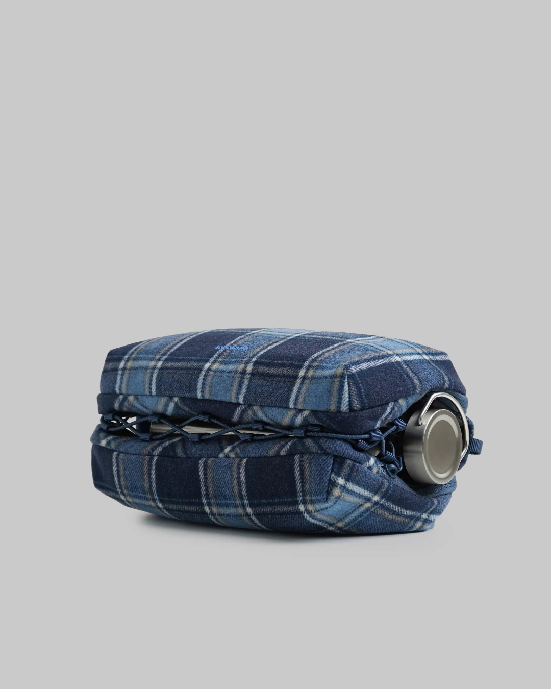 Sacoche porte-bouteille Merci Paris Topologie en tissu bleu à carreaux avec cordon élastique de maintien