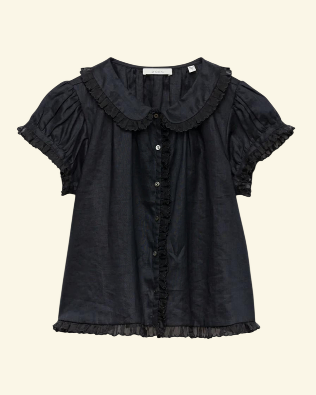 Blouse noire Merci Paris Dôen Karina en ramie avec col festonné, manches bouffantes et boutons en nacre étoilés