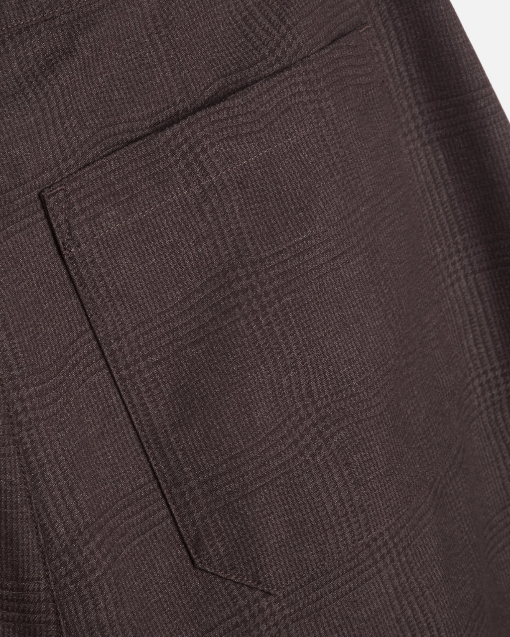 Gros plan sur la poche arrière du pantalon Deadbeat marron en jacquard de coton mélangé Merci Paris