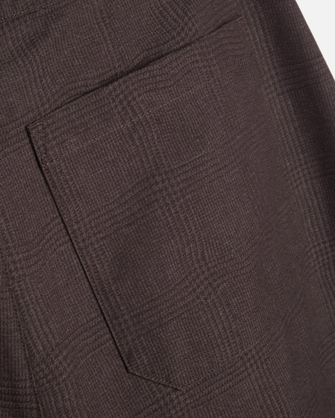 Gros plan sur la poche arrière du pantalon Deadbeat marron en jacquard de coton mélangé Merci Paris