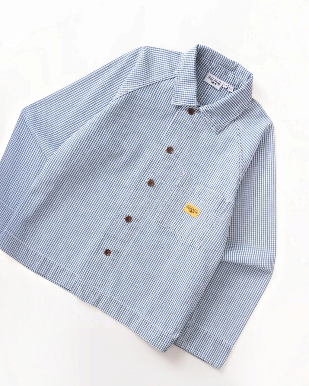 Surchemise Merci Paris Service Works en coton biologique bleu à motif vichy avec poche poitrine et manches raglan