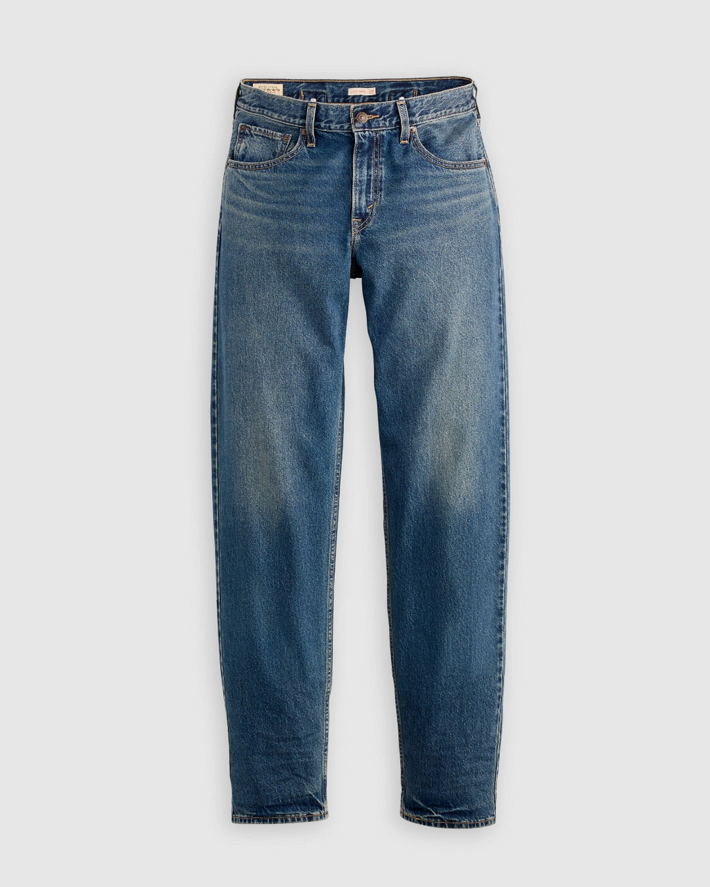 Jean Levi's Loose Taper bleu vintage en coton rigide avec coupe ample et jambes fuselées chez Merci Paris