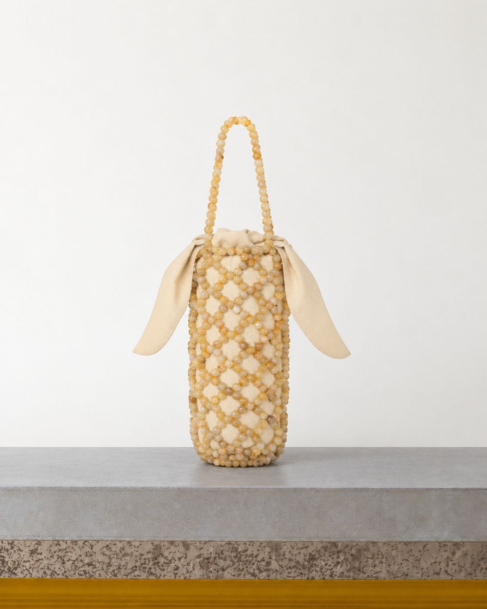 Cordera - Sac Perles Jaspe Miel - Beige – Vue sur banc