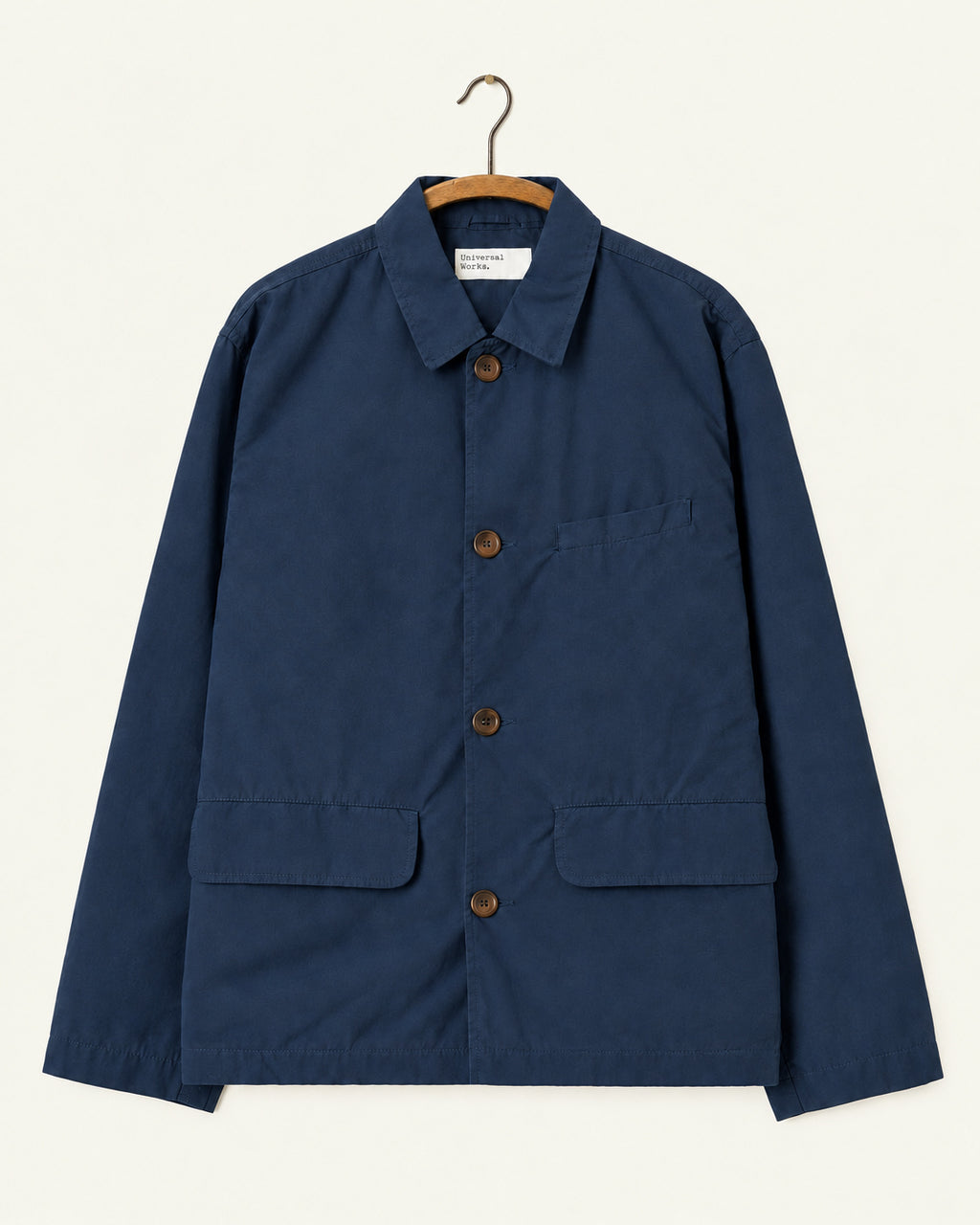 Universal Works - Veste Warmus - Marine, vue de face sur cintre