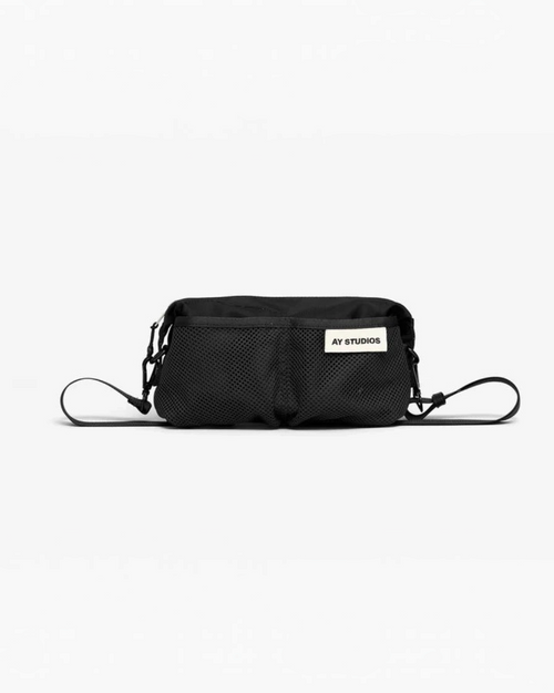 Sac bandoulière noir Merci Paris AY Studios en nylon recyclé avec poche filet frontale et design minimaliste